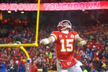 Jan 12, 2019; Kansas City, MO, USA; Kansas City Chiefs quarterback Patrick Mahomes (15) celebrates after a touchdown during the fourth quarter against the Indianapolis Colts in an AFC Divisional playoff football game at Arrowhead Stadium. Mandatory Credit: Mark J. Rebilas-USA TODAY Sports