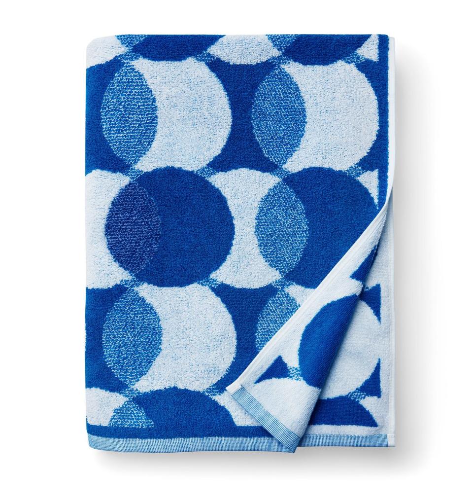 folded blue towel with venn diagram like circles with different hues of blue