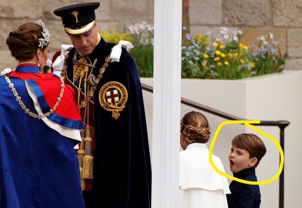 circle around the child yawning behind his father