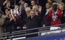 Britain Soccer Football - Southampton v Manchester United - EFL Cup Final - Wembley Stadium - 26/2/17 Manchester United manager Jose Mourinho lifts the trophy as they celebrate winning the EFL Cup Final Reuters / Hannah McKay