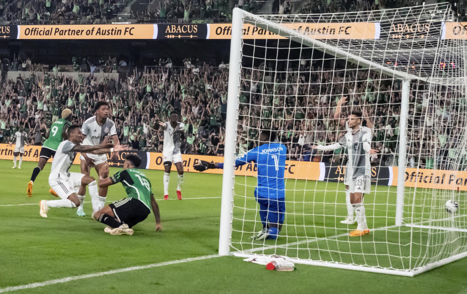 Toronto FC players react after a header goal by Austin forward Gyasi Zardes (9) during the second half of an MLS soccer game, Saturday, May 20, 2023, in Austin, Texas. (AP Photo/Michael Thomas)