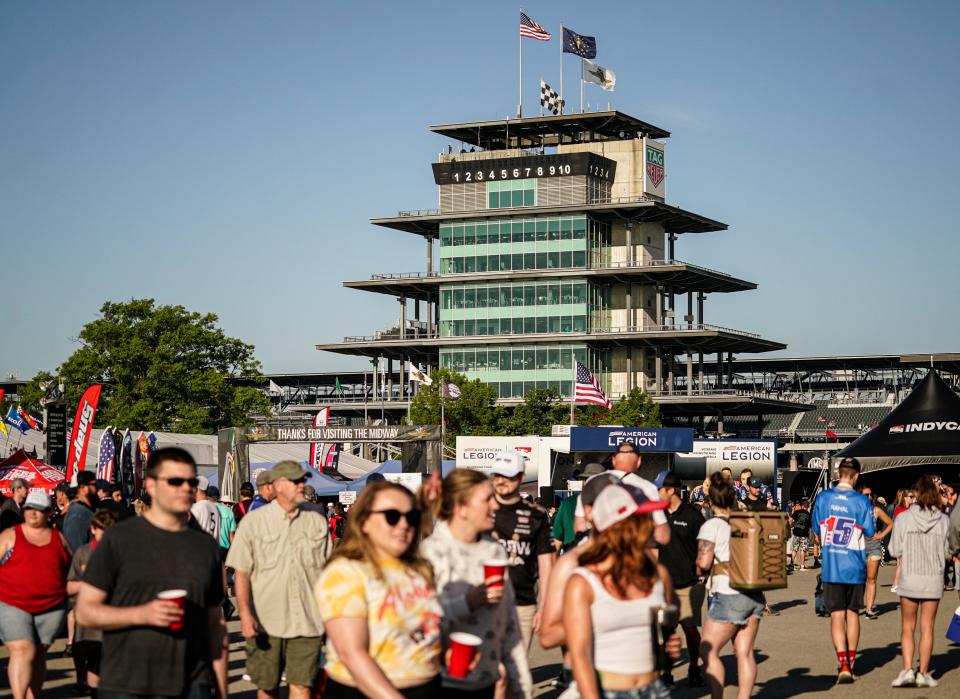 Fans mix and mingle ahead of the 106th running of the Indianapolis 500 at Indianapolis Motor Speedway.