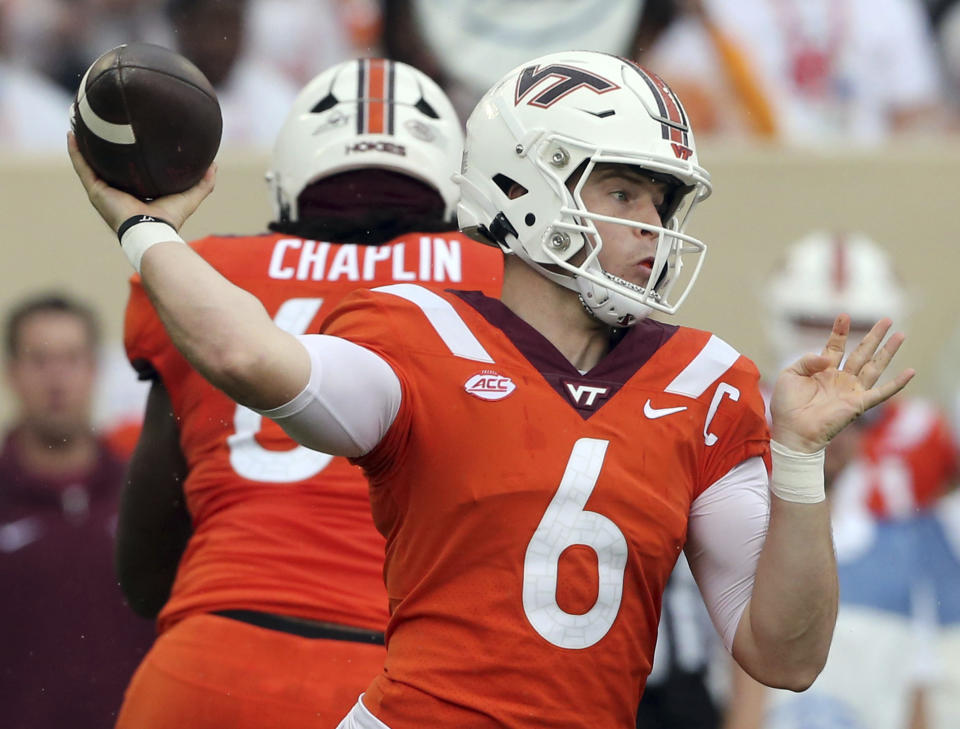 Virginia Tech quarterback Grant Wells (6) throws in the first half of an NCAA college football game against Purdue in Blacksburg, Va., Saturday, Sept. 9 2023. (Matt Gentry/The Roanoke Times via AP)