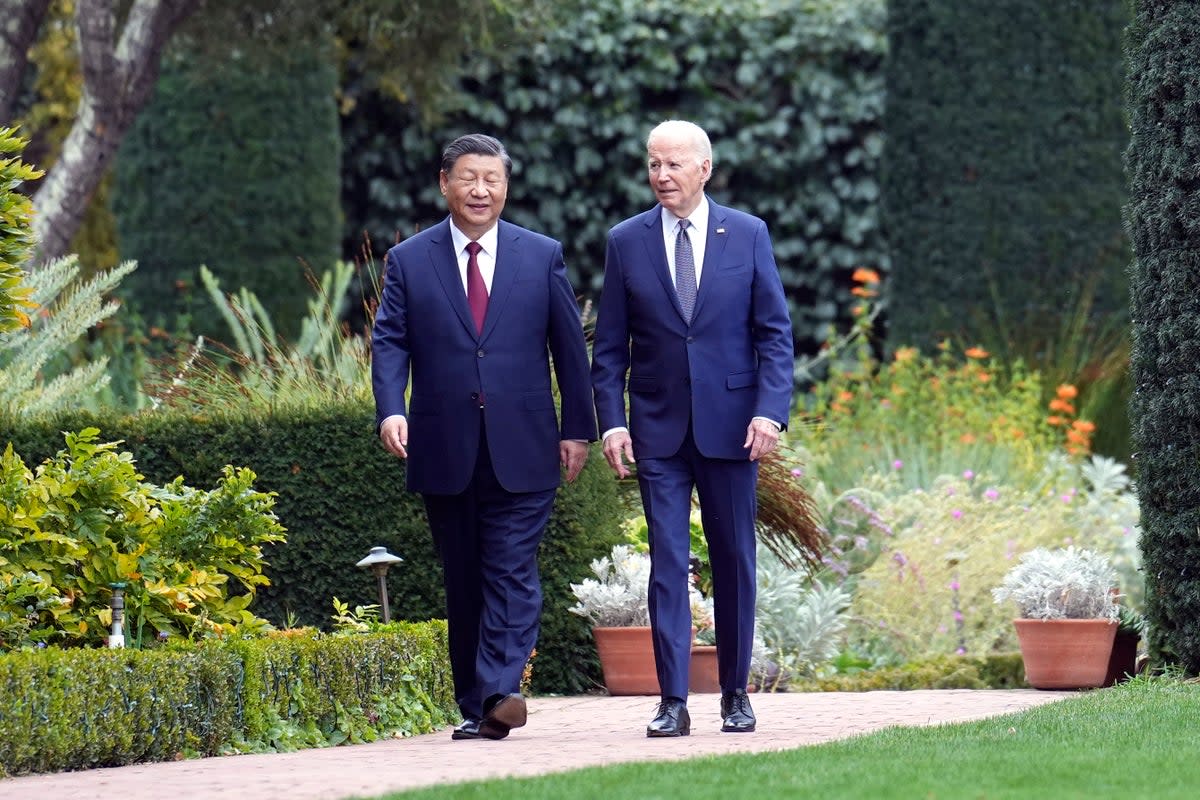 President Joe Biden and China's President President Xi Jinping walk in the gardens at the Filoli Estate in Woodside, Calif., Wednesday, Nov, 15, 2023, on the sidelines of the Asia-Pacific Economic Cooperative conference. (Doug Mills/The New York Times via AP, Pool) (AP)