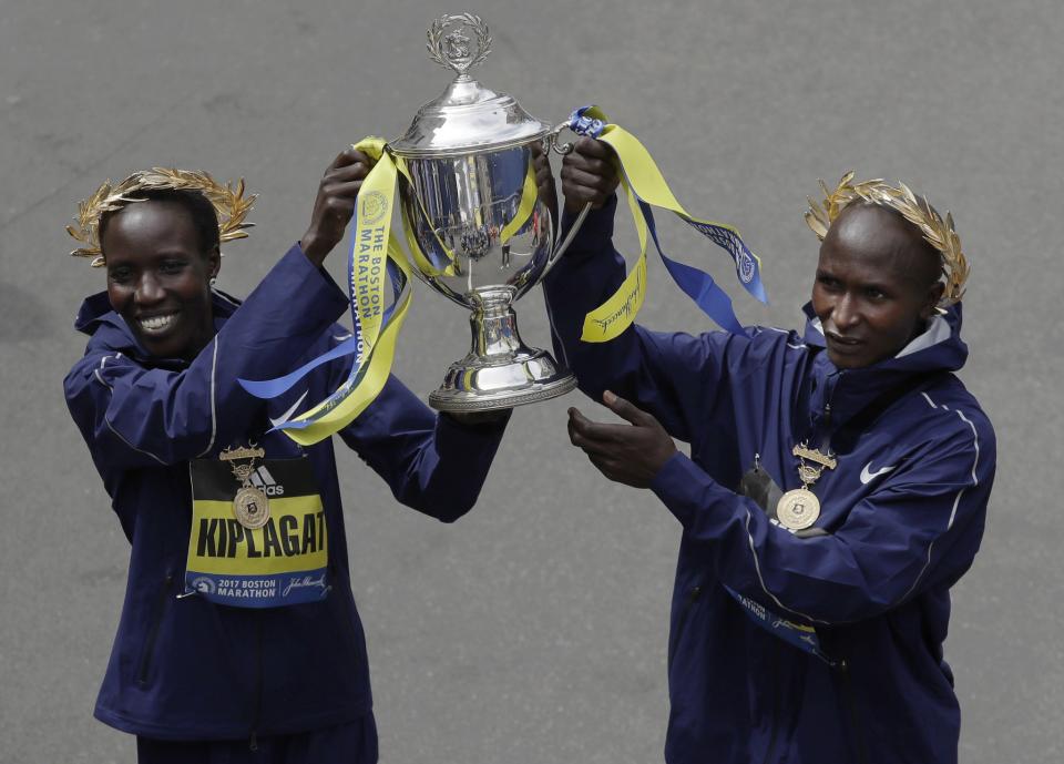 Kenyans Edna Kiplagat, left, and Geoffrey Kirui won the women’s and men’s open divisions of the 2017 Boston Marathon. (AP)