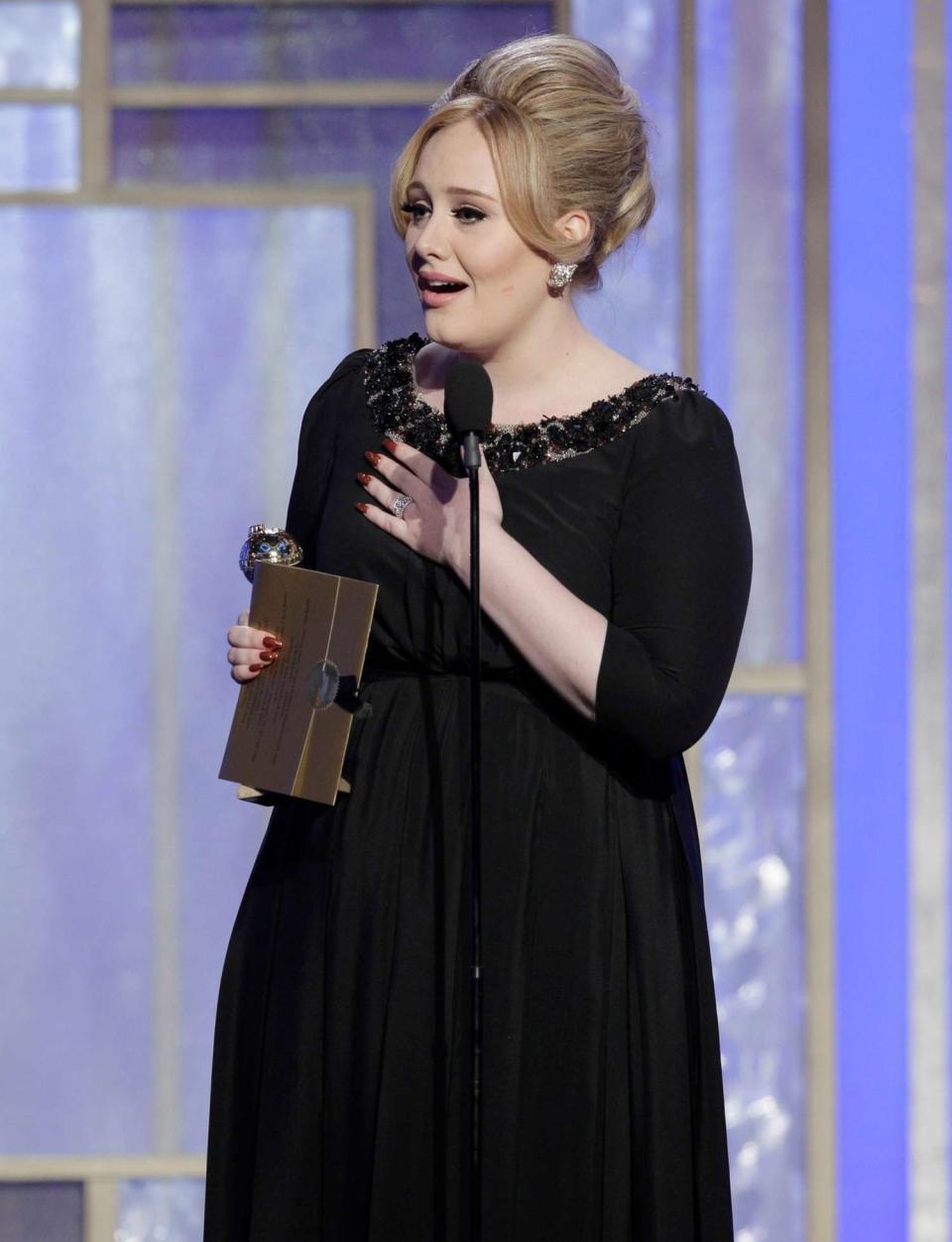 Adele accepts the Best Original Song award for Motion Picture, "Skyfall" on stage during the 70th Annual Golden Globe Awards at the Beverly Hilton Hotel International Ballroom on January 13, 2013 in Beverly Hills, California