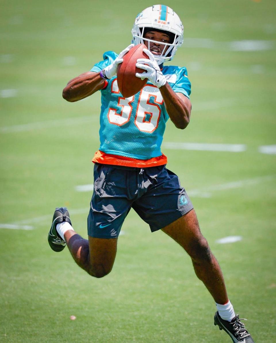 Miami Dolphins wide receiver Storm Duck (36) catches a pass during practice.