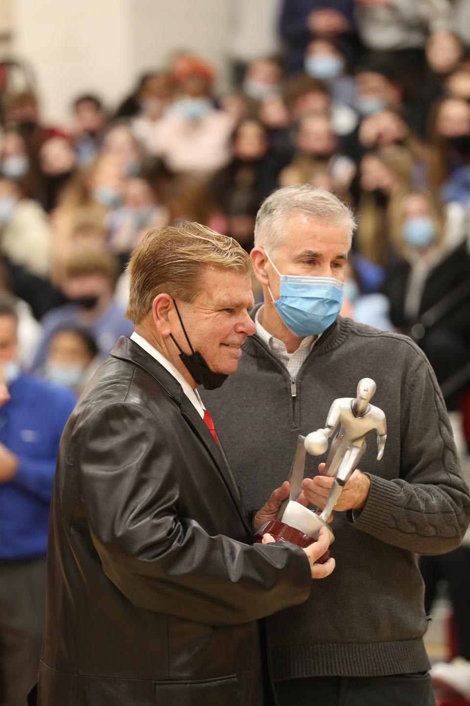 Mike Leith, of Quincy, was inducted into the school's Hall of Fame during halftime of the North Quincy/Quincy basketball game Friday, January 21, 2022 .