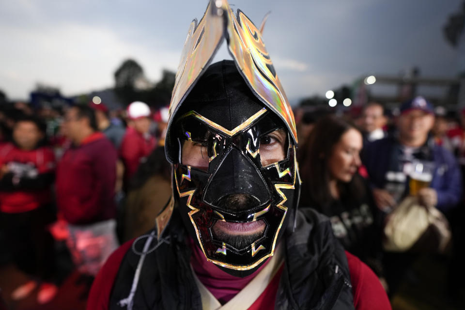 A San Francisco 49ers fan looks on before an NFL football game between the Arizona Cardinals and the San Francisco 49ers Monday, Nov. 21, 2022, in Mexico City. (AP Photo/Fernando Llano)