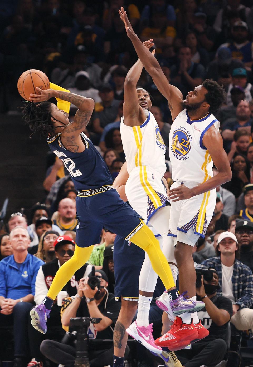 Memphis Grizzlies guard Ja Morant shoots the ball over Golden State Warriors guard Andrew Wiggins during game two of the second round for the 2022 NBA playoffs at FedExForum on Tuesday, May 3, 2022.