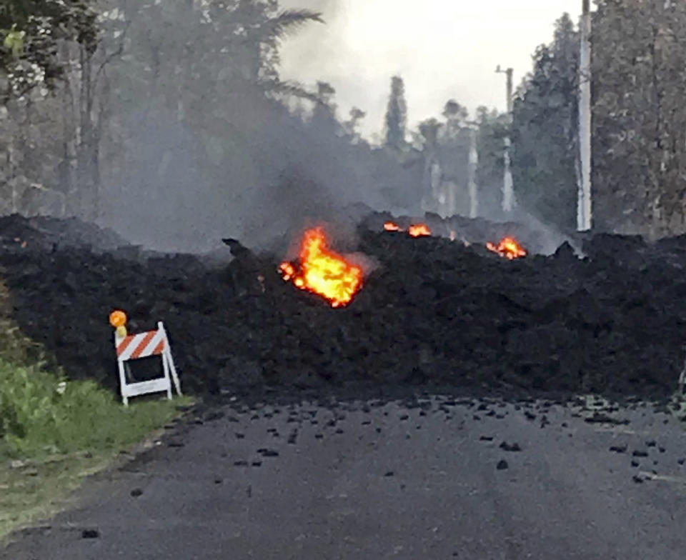 Lava flows near the Leilani Estates on the Big Island of Hawaii forcing the evacuation of nearly 2,000 residents. Source: Hawaii Electric Light via AP