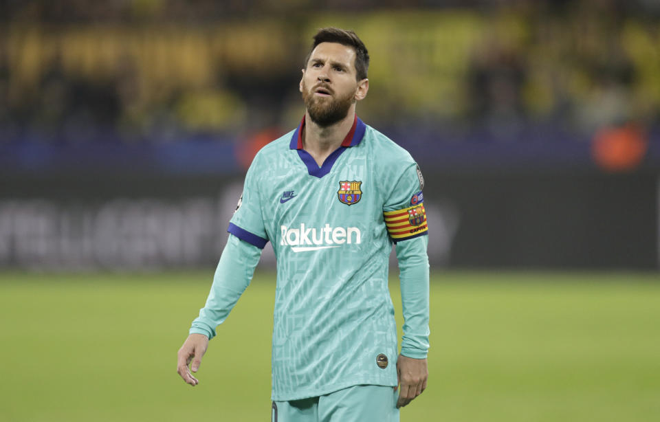 Barcelona's Lionel Messi looks up during the Champions League Group F soccer match between Borussia Dortmund and FC Barcelona in Dortmund, Germany, Tuesday, Sept. 17, 2019. (AP Photo/Michael Probst)