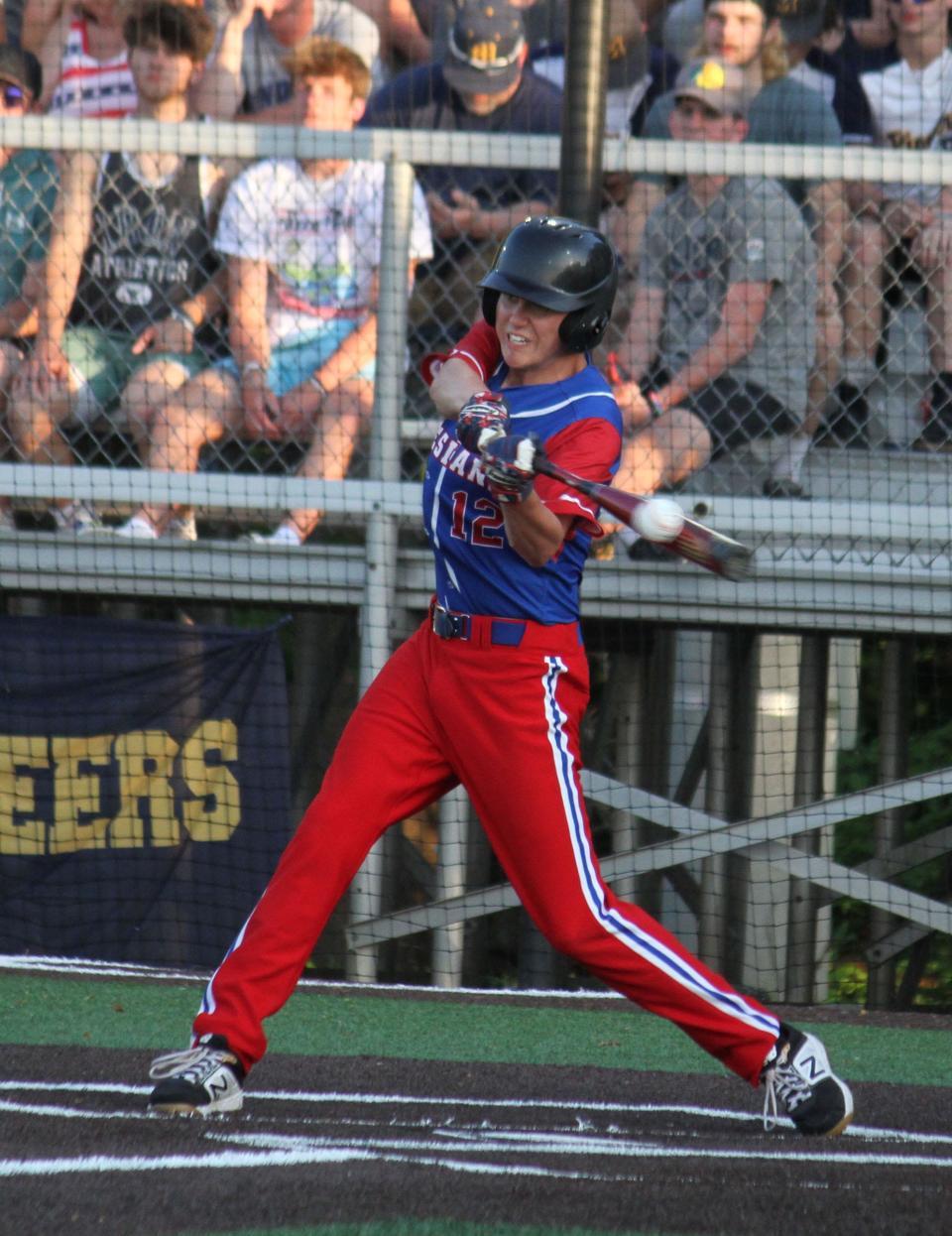 Martinsville senior Matt Decker puts the ball in play during Monday's IHSAA Sectional championship game against Mooresville. 