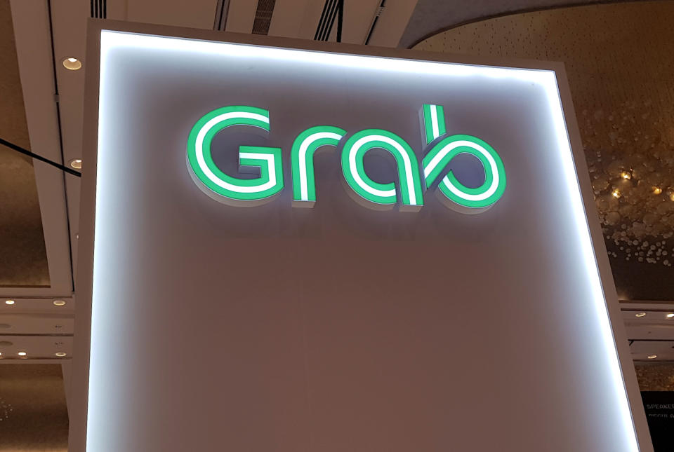 A Grab logo is pictured at the Money 20/20 Asia Fintech Trade Show in Singapore March 21, 2019. Picture taken March 21, 2019. REUTERS/Anshuman Daga