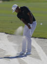 Tony Finau, of the United States, hits out of sand on the third hole during the first round of the Hero World Challenge PGA Tour at the Albany Golf Club, in New Providence, Bahamas, Thursday, Dec. 2, 2021.(AP Photo/Fernando Llano)