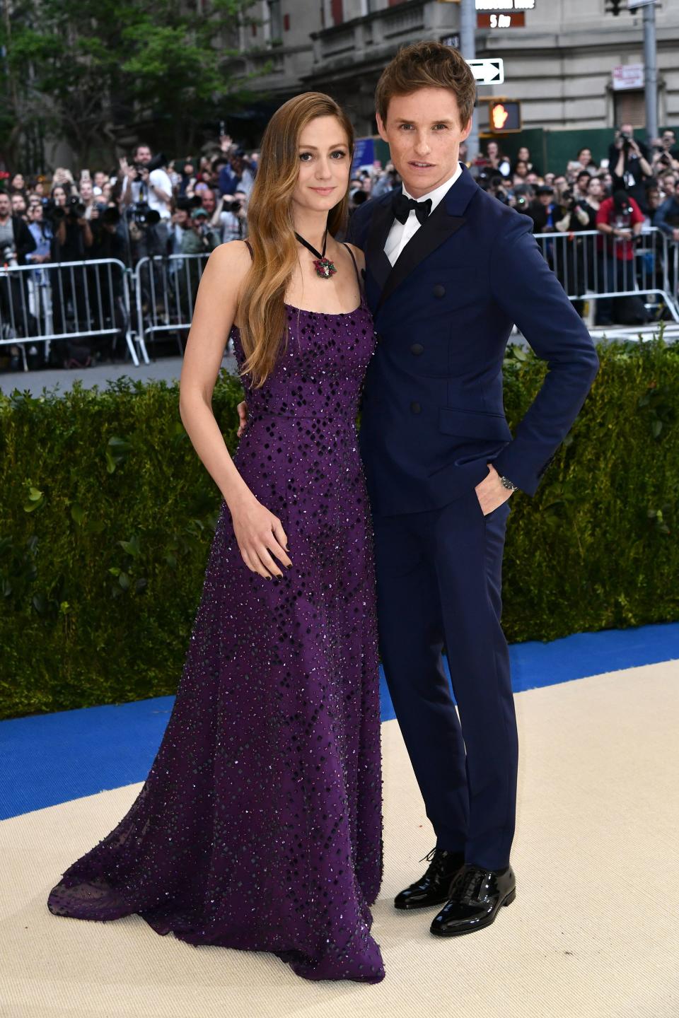 <h1 class="title">Hanna Redmayne and Eddie Redmayne in Prada</h1><cite class="credit">Photo: Shutterstock</cite>