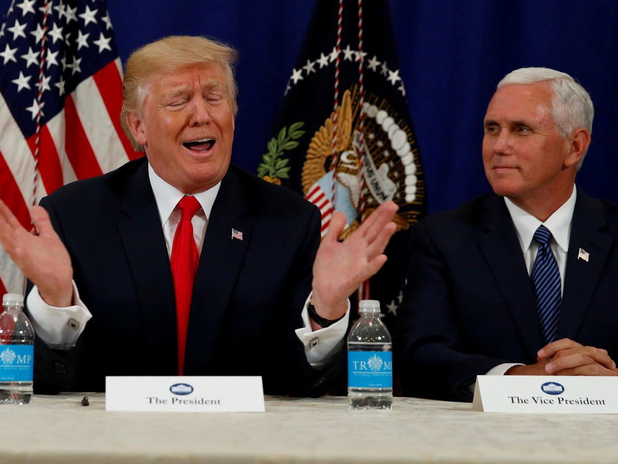 US President Donald Trump with Vice President Mike Pence speaking to reporters following a security briefing: REUTERS/Jonathan Ernst TPX IMAGES OF THE DAY