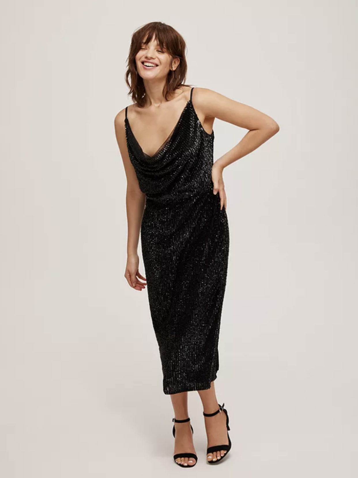 This scoop neck dress can be effortlessly dressed up or down. (John Lewis)