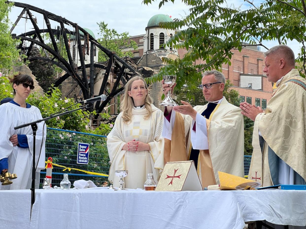 Rev. Don Beyers, of St. Anne's Anglican Church, right, previously said the church is committed to working with the Dufferin Grove and Davenport community to serve its congregation.  ( Spencer Gallichan-Lowe/CBC - image credit)