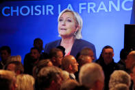 <p>French presidential candidate Marine Le Pen is shown on a screen while conceding defeat at the Chalet du Lac in the Bois de Vincennes in Paris, after the second round of 2017 French presidential election, May 7, 2017. (Charles Platiau/Reuters) </p>