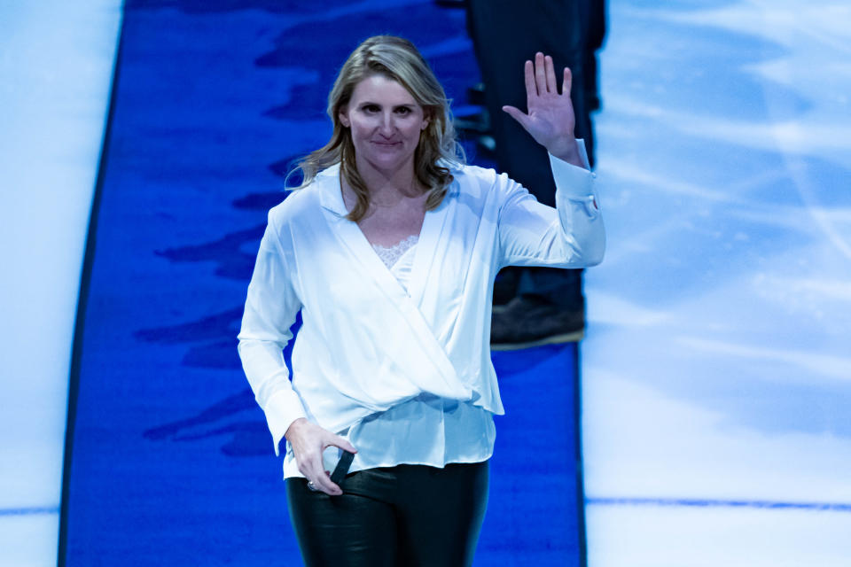 TORONTO, ON - NOVEMBER 15: Four-time Olympic gold medallist Hayley Wickenheiser waves to the crowd during the 2019 Hockey Hall of Fame induction ceremony ahead of the NHL regular season game between the Boston Bruins and the Toronto Maple Leafs on November 15, 2019, at Scotiabank Arena in Toronto, ON, Canada. (Photo by Julian Avram/Icon Sportswire via Getty Images)