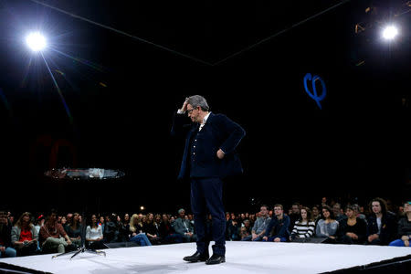 FILE PHOTO: Jean-Luc Melenchon of the French far left Parti de Gauche and candidate for the 2017 French presidential election delivers a speech as he holds a political rally in Rennes, France, March 26, 2017. REUTERS/Stephane Mahe/File Photo