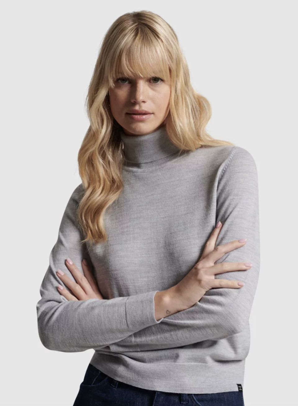 Model in Studios Merino Roll Neck Jumper from Superdry