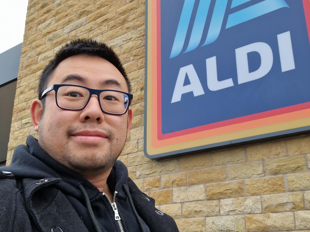 Selfie of the writer in front of Aldi sign