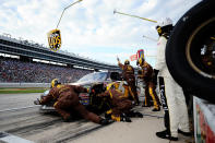 FORT WORTH, TX - NOVEMBER 06: David Ragan, driver of the #6 UPS My Choice Ford, pits during the NASCAR Sprint Cup Series AAA Texas 500 at Texas Motor Speedway on November 6, 2011 in Fort Worth, Texas. (Photo by Jared C. Tilton/Getty Images for NASCAR)