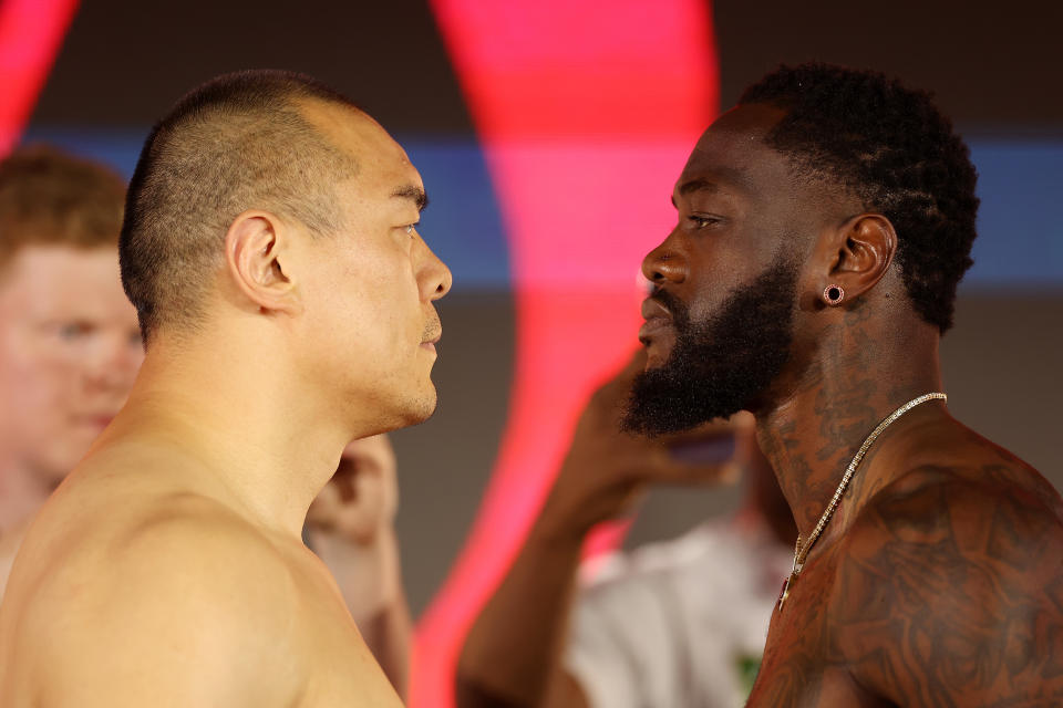 RIYADH, SAUDI ARABIA - MAY 31: Zhilei Zhang of Team Queensberry and Deontay Wilder of Team Matchroom face off during the 5v5: Queensberry v Matchroom Weigh-Ins event ahead of their Heavyweight fight at Boulevard World on May 31, 2024 in Riyadh, Saudi Arabia. (Photo by Richard Pelham/Getty Images)