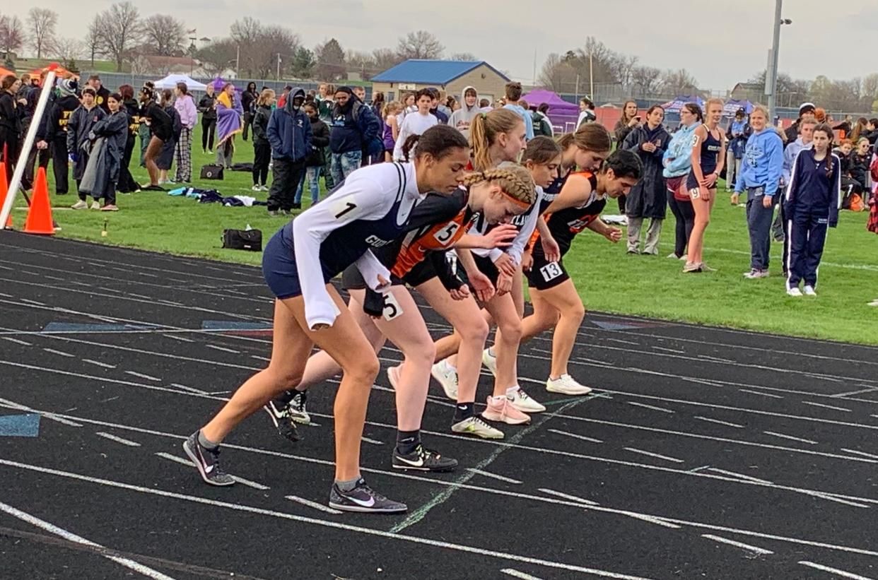 Guilford's Michelle Gasmund gets set to take off at the start of the 800-meter run at the NIC-10 girls track and field meet in Belvidere on Thursday, May 5, 2022. Gasmund won the race in dominant fashion, and advanced to state in that event the next week.