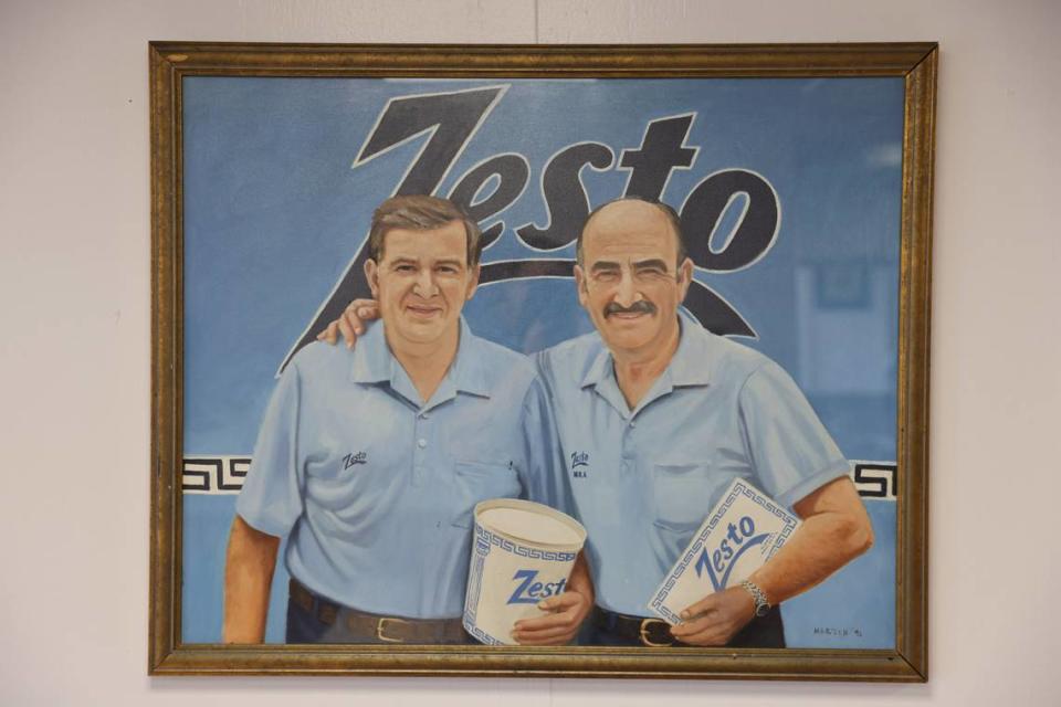 A painting of Gus Manos and Angelo Tsiantis, who co-owned Zesto of West Columbia, hangs in the restaurant on Monday, May 20, 2024.