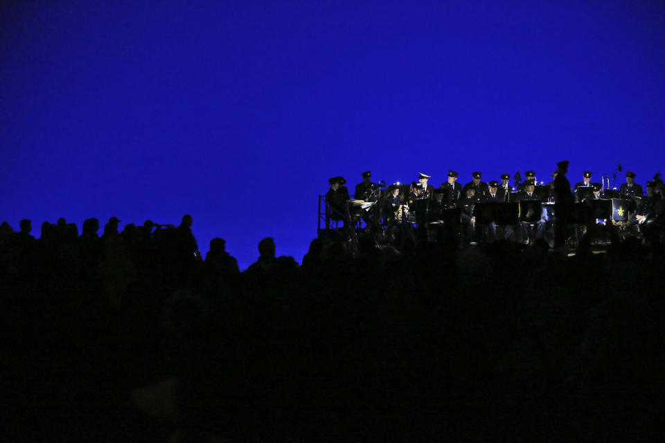 Army officers observe a minute of silence during the Dawn Service ceremony at the Anzac Cove beach, the site of World War I landing of the ANZACs (Australian and New Zealand Army Corps) on April 25, 1915, in Gallipoli peninsula, Turkey, early Thursday, April 25, 2019. As dawn broke, families of soldiers, leaders and visitors gathered near former battlefields, honouring thousands of Australians and New Zealanders who fought in the Gallipoli campaign of World War I on the ill-fated British-led invasion. The doomed Allied offensive to secure a naval route from the Mediterranean to Istanbul through the Dardanelles, and take the Ottomans out of the war, resulted in over 130,000 deaths on both sides.(AP Photo/Emrah Gurel)