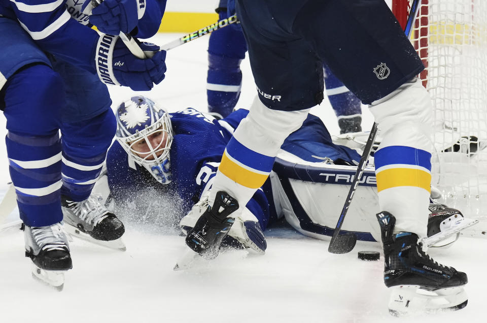 Toronto Maple Leafs goaltender Ilya Samsonov (35) makes a save against the St. Louis Blues during the third period of an NHL hockey game, Tuesday, Feb. 13, 2024 in Toronto. (Nathan Denette/The Canadian Press via AP)