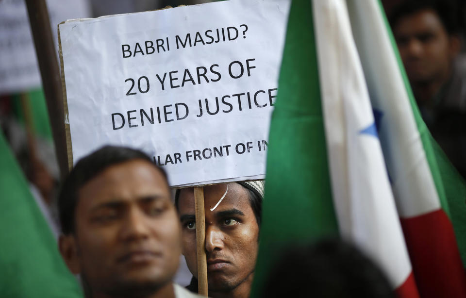 FILE- Indian Muslims stage a sit-in protest in New Delhi to mark the 20th anniversary of the Babri mosque demolition in Ayodhya in northern India, Dec. 6, 2012. Three decades after Hindu mobs tore down a historical mosque, Indian Prime Minister Narendra Modi will attend the consecration of a grand Hindu temple at the same site on Monday in a political move to boost his party ahead of a crucial national vote. (AP Photo/Saurabh Das, File)