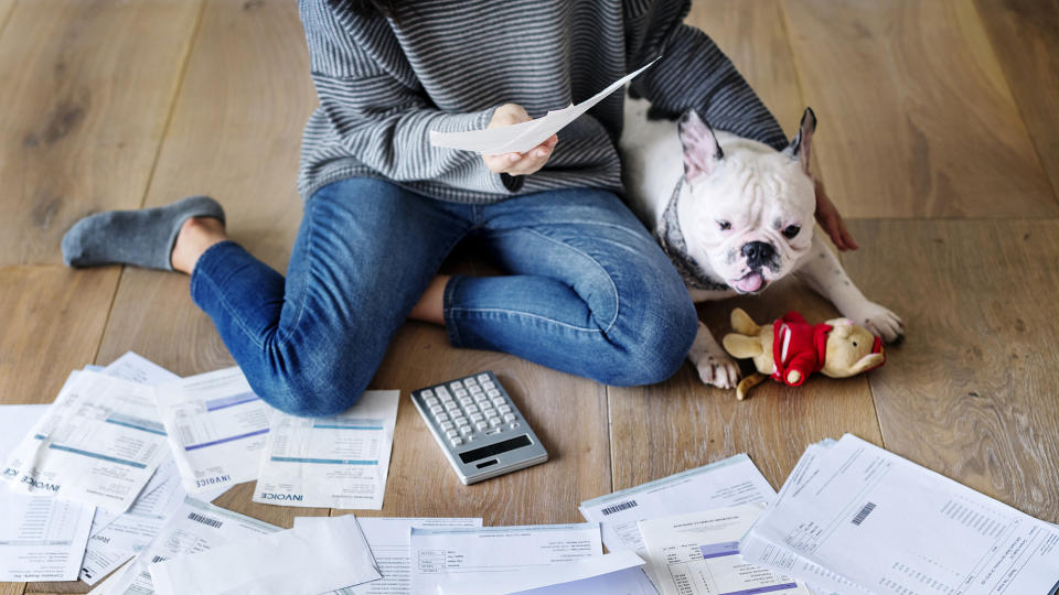 Woman managing the debt.