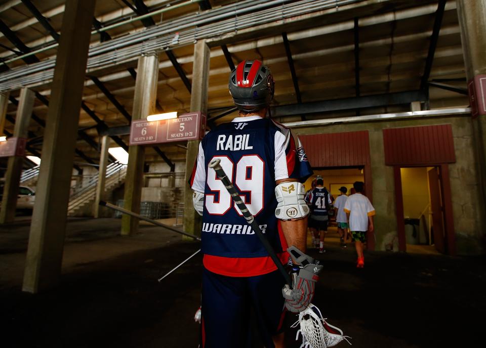 Paul Rabil, then with the Boston Cannons, walks through Harvard Stadium before a game against the Denver Outlaws in 2014. (Getty)