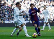 <p>Lionel Messi takes on Real Madrid’s Sergio Ramos </p>