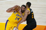 Utah Jazz center Rudy Gobert (27) defends against Los Angeles Lakers center Marc Gasol (14) during the first half of an NBA basketball game Wednesday, Feb. 24, 2021, in Salt Lake City. (AP Photo/Rick Bowmer)
