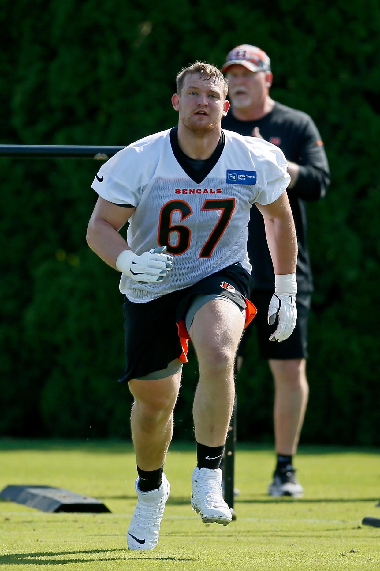 Offensive lineman Cordell Volson (67) runs drills during the first day of Cincinnati Bengals rookie camp at the Paul Brown Stadium practice field in downtown Cincinnati on Friday, May 13, 2022. 