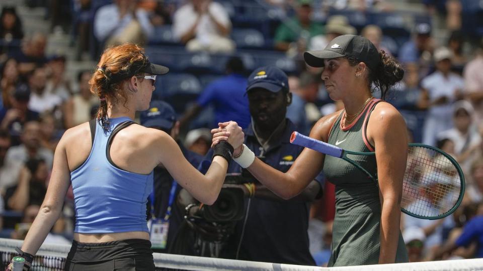 Madison Keys shakes Maya Joint's hand.