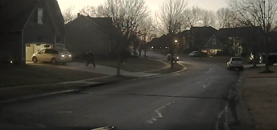 Dash cam video footage from 20 January 2018 included in the Washington Post’s visual investigation shows Officer Clayton Jenisen approaching the minivan driven by 17-year-old John Albers with his weapon drawn (Washington Post/video screengrab)
