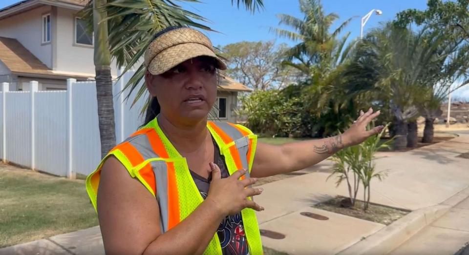 PHOTO: Kanani Adolpho came from across the island to help distribute goods to residents in Leiali`i, part of the Hawaiian home lands. (ABC News)