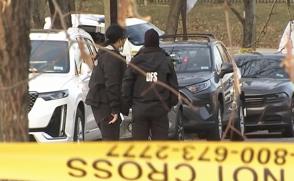 Members of the District of Columbia Department of Forensic Sciences investigate the crime scene of a shooting in Washington, D.C. (NBC Washington)