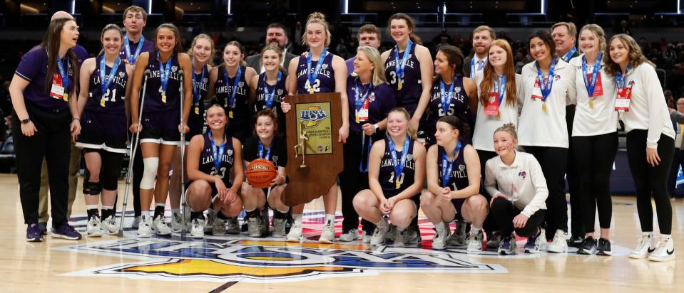 Lanesville Eagles pose for a photo after the IHSAA girls basketball Class 1A state championship against the Marquette Blazers, Saturday, Feb. 24, 2024, at Gainbridge Fieldhouse in Indianapolis. Lanesville Eagles won 51-43.