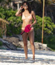 <p>Michelle Rodriguez plays beach games as she vacations in Tulum, Mexico on Dec. 21.</p>