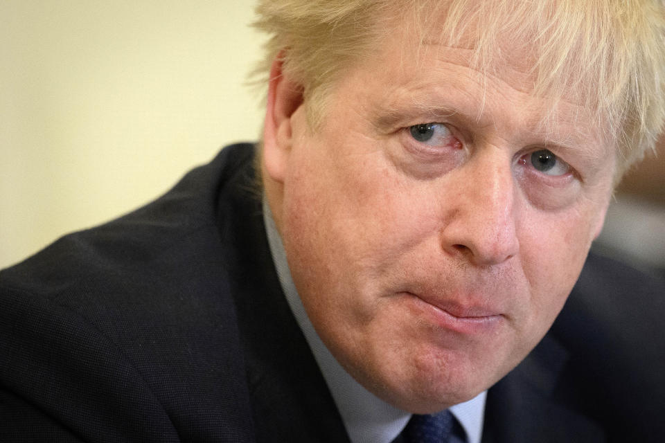 Britain's Prime Minister Boris Johnson addresses his Cabinet during his weekly Cabinet meeting in Downing Street on Tuesday, June 7, 2022 in London. Johnson was meeting his Cabinet and trying to patch up his tattered authority on Tuesday after surviving a no-confidence vote that has left him a severely weakened leader. (Leon Neal/Pool Photo via AP)