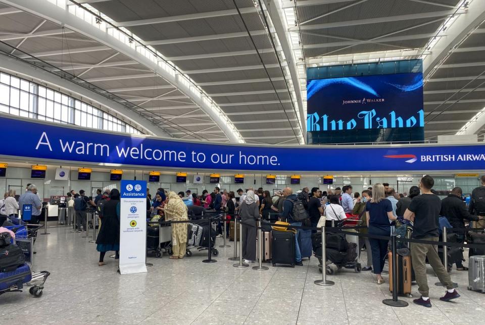 Passengers queue to check-in for a Qatar Airways flight in Terminal 5 at Heathrow Airport as the Transport Secretary is risking travel chaos by rejecting calls for an emergency visa for aviation workers, industry bosses have claimed. Picture date: Friday June 3, 2022. (PA Wire)