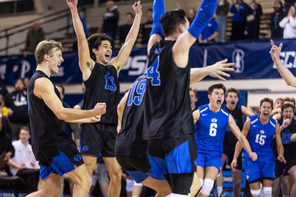 The Brigham Young Cougars celebrate the match point at an NCAA men’s volleyball match against the Long Island Sharks at the Smith Fieldhouse in Provo on Thursday, Feb. 8, 2023. | Marielle Scott, Deseret News