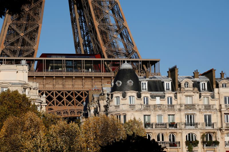 FILE PHOTO: The Eiffel Tower stands near luxury Haussmannian buildings in the 7th arrondissement district of Paris